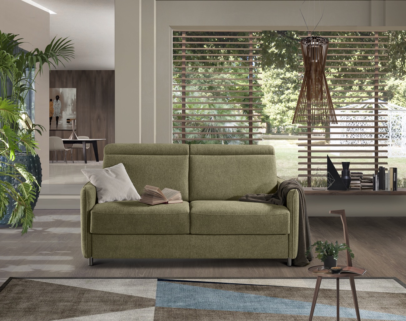 Canapé convertible vert dans un salon
