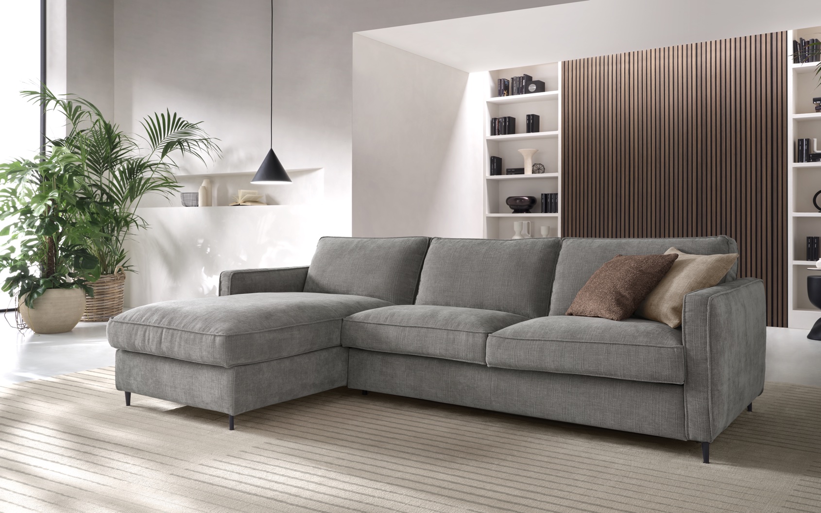 Canapé convertible ouvert dans un salon moderne