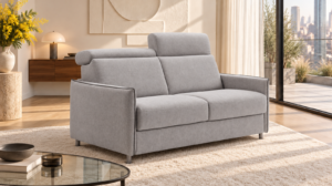 Canapé convertible Mona en tissu Bull, vue de trois-quarts avec têtière